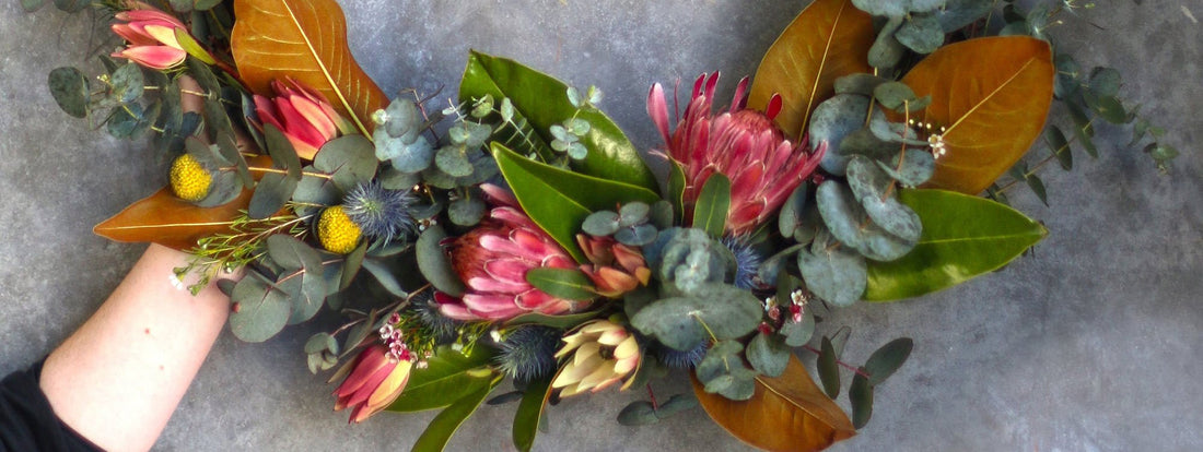 Shop real flower Christmas wreaths in Melbourne, handcrafted with Australian native flowers. Beautiful, long-lasting and naturally festive.